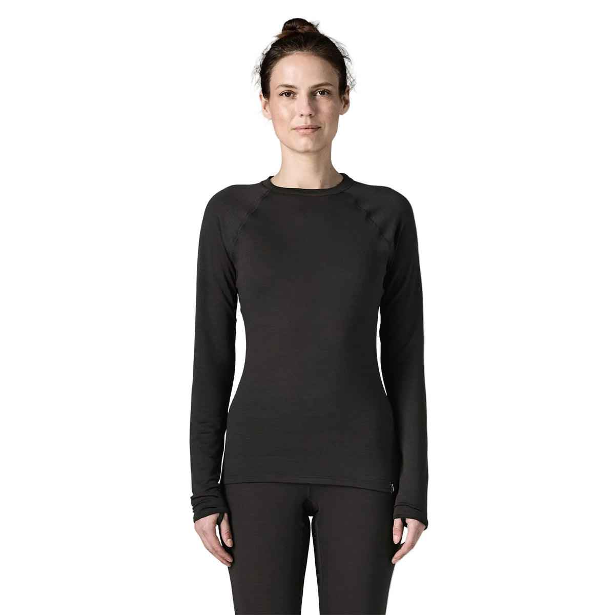 Patagonia Women's Capilene Thermal Weight Crewneck Black featuring Polartec® Power Grid® fleece, raglan sleeves and thumb loops.