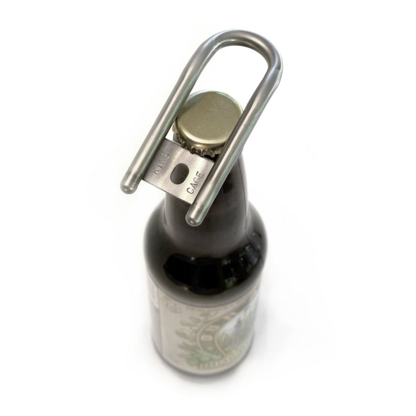 King Cage titanium bottle opener in action
