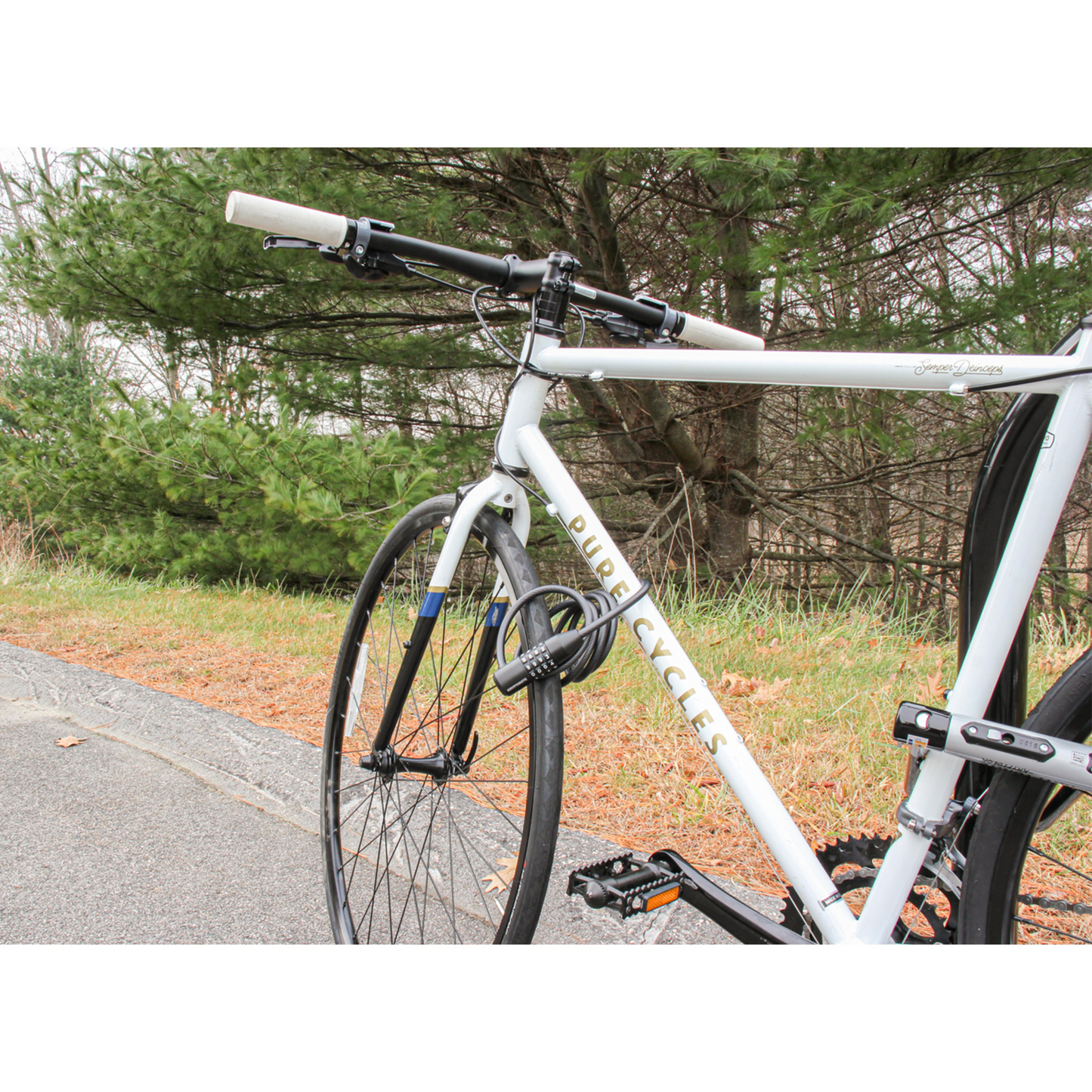 Kryptonite KryptoFlex 1218 combination cable lock used to Locke frame and front wheel.