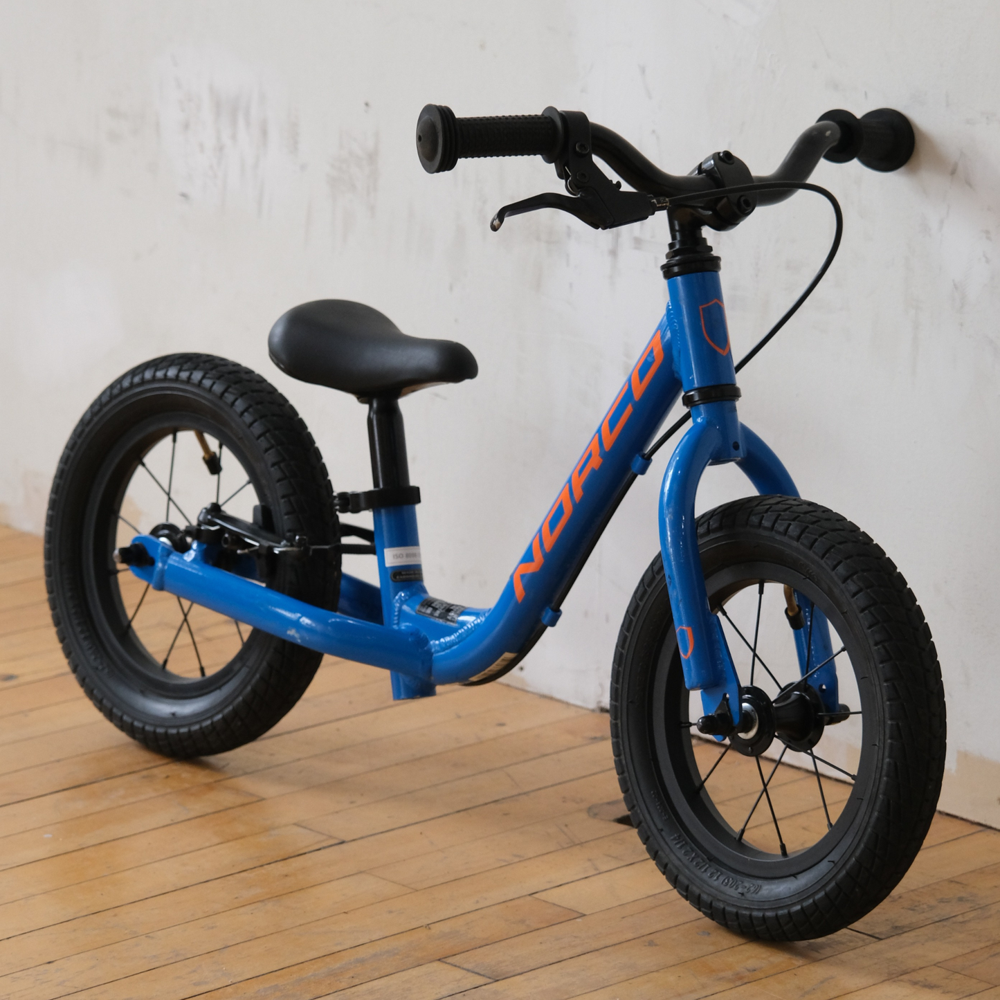 Norco Runner 12 Blue balance bike front side view