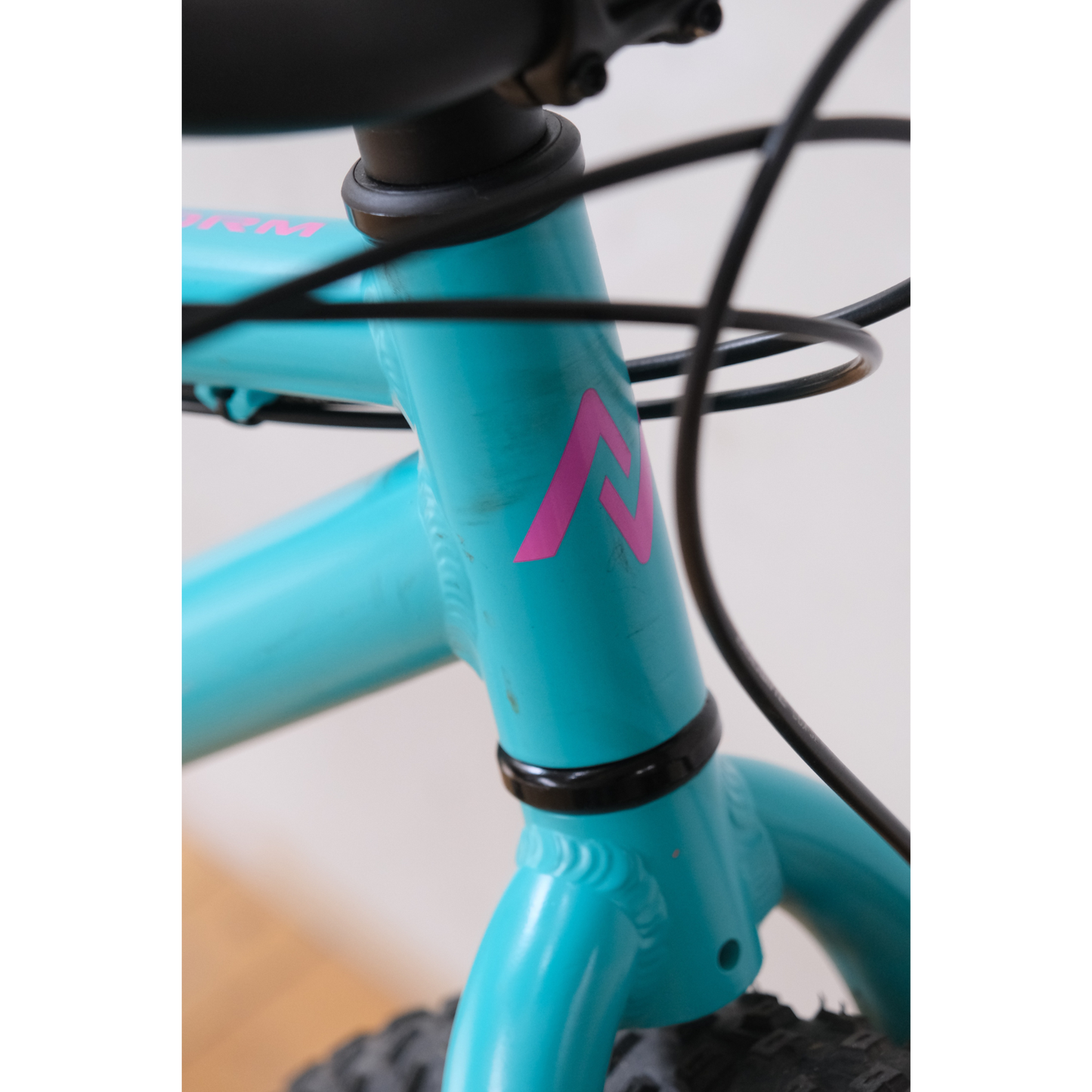 Norco Storm Disc 24 Teal front tube view