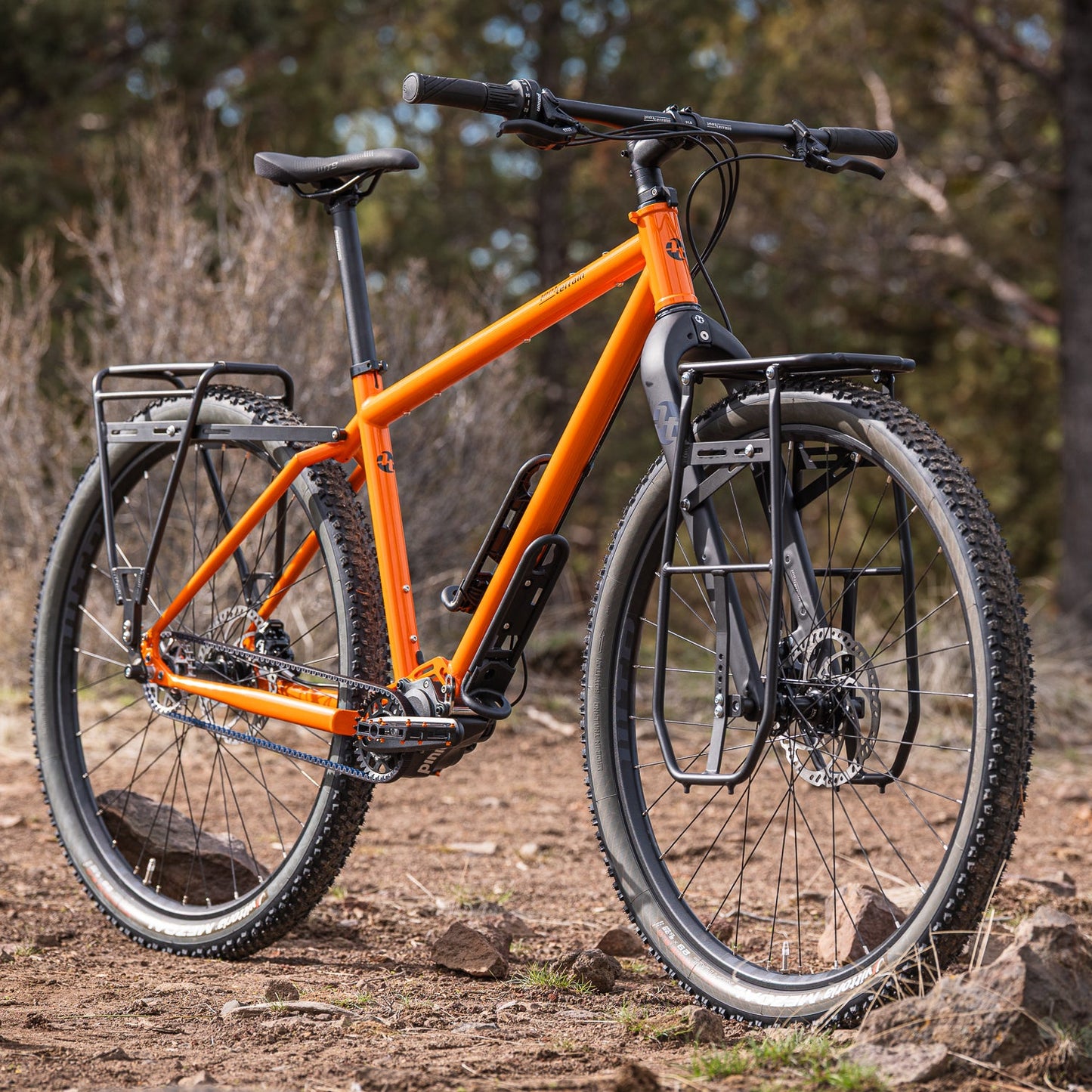 Old Man Mountain Impala Lowrider front bicycle rack with extra-low pannier rails, aluminum cargo deck and adjustable fit for wheels up to 29". Designed for bikepacking, adventures and cargo.