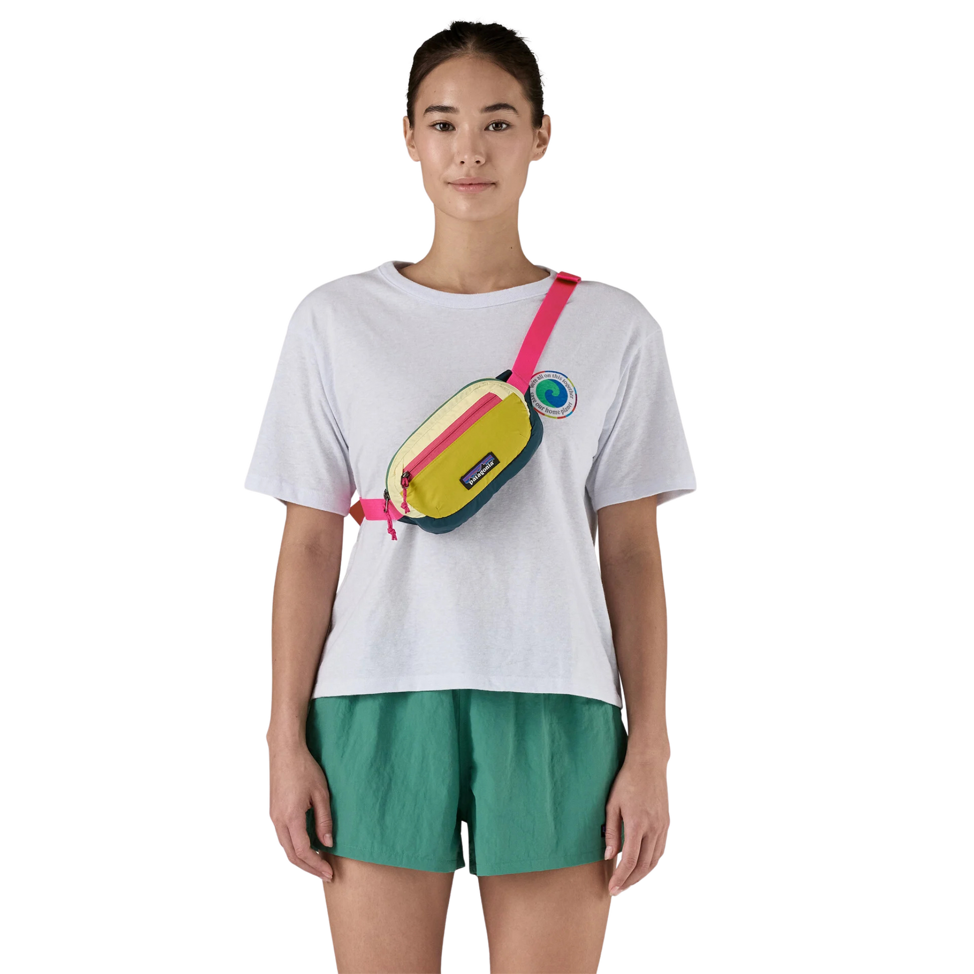 Patagonia Terravia Mini Hip Pack 1L in Butter Cup Yellow worn over shoulder