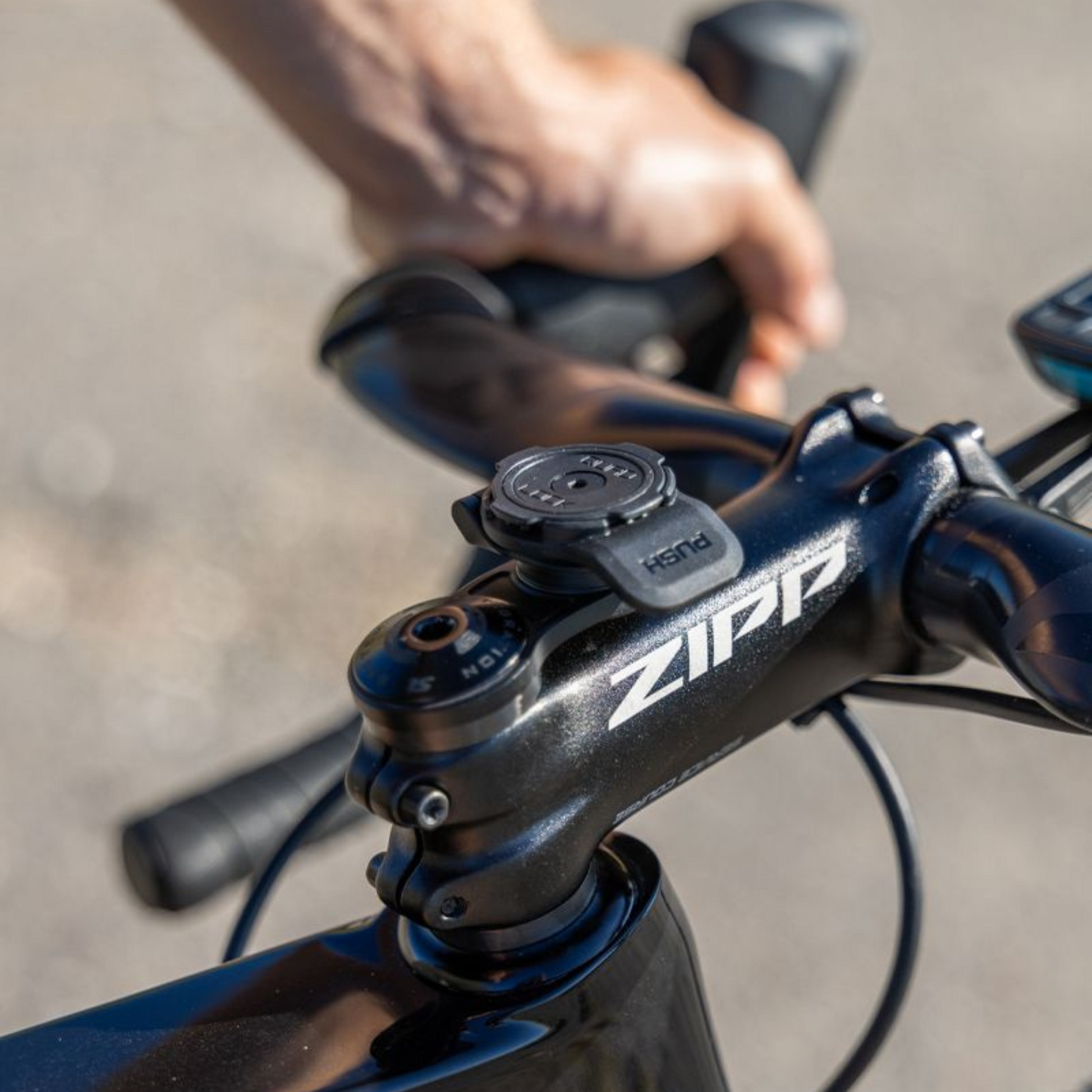Quad Lock Stem Cap Mount mounted under stem cap