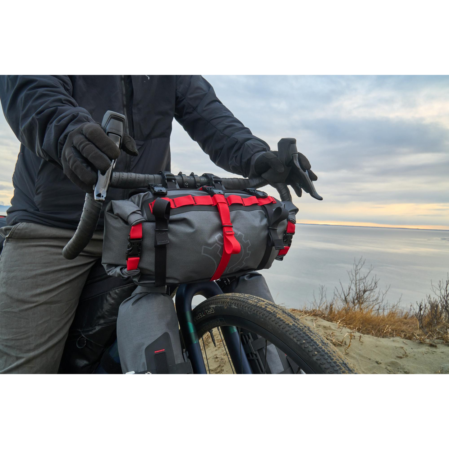 Revelate Designs Saltyroll dry bag mounted to a drop bar bike