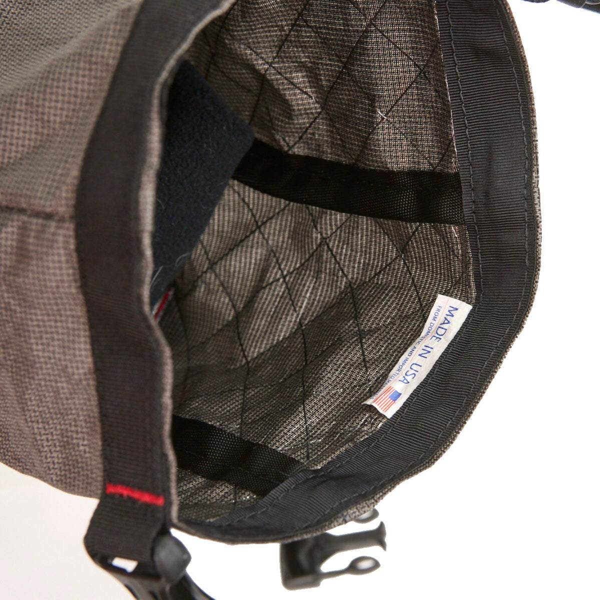 Revelate Designs Ultra Shrew 2.25L seat bag, a lightweight saddle-rail mounted bikepacking bag with roll-top closure for fast, all-terrain rides.