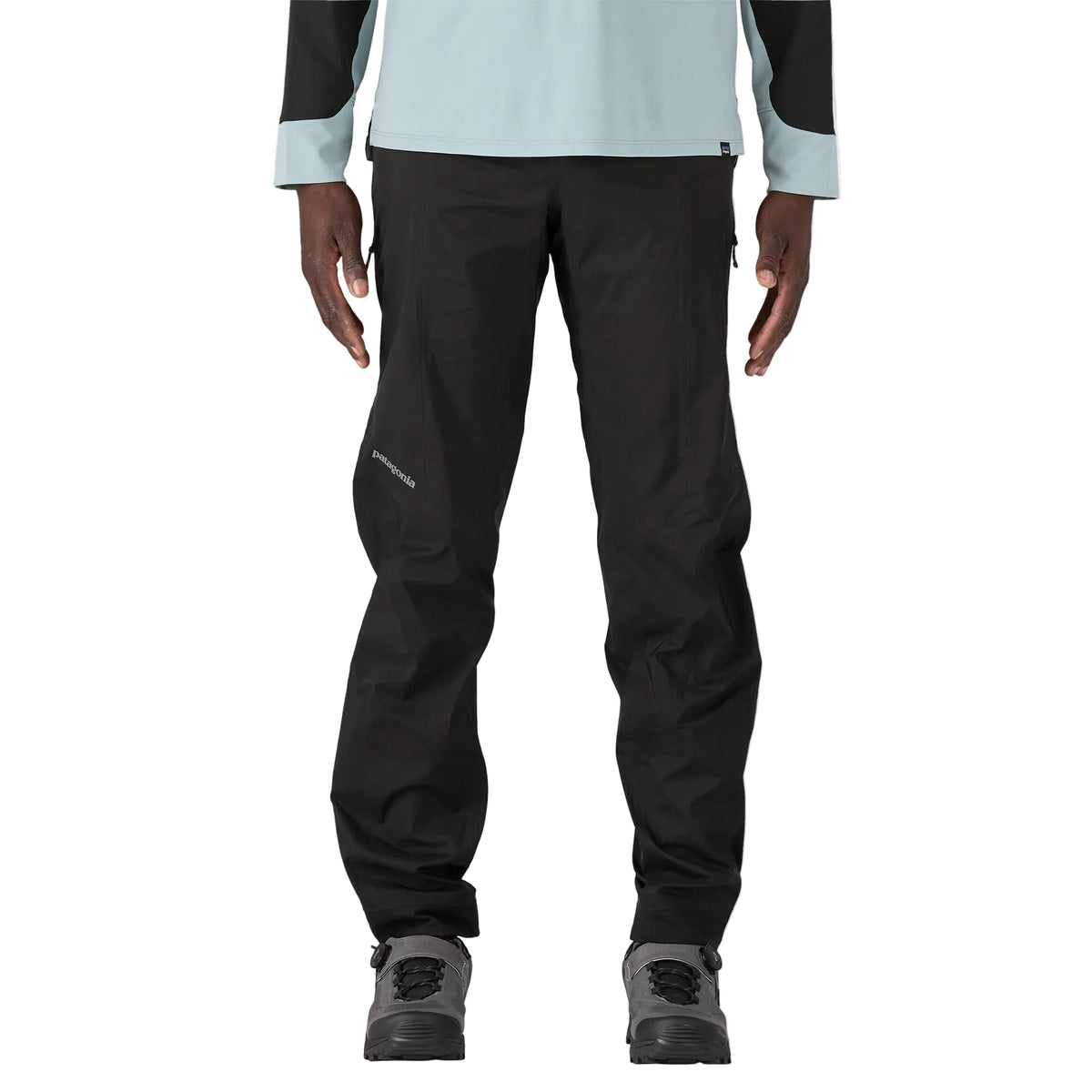 Patagonia Men's Dirt Roamer Storm waterproof mountain bike pants with reinforced knees, adjustable OppoSet® waistband, zippered thigh pockets and leg openings.
