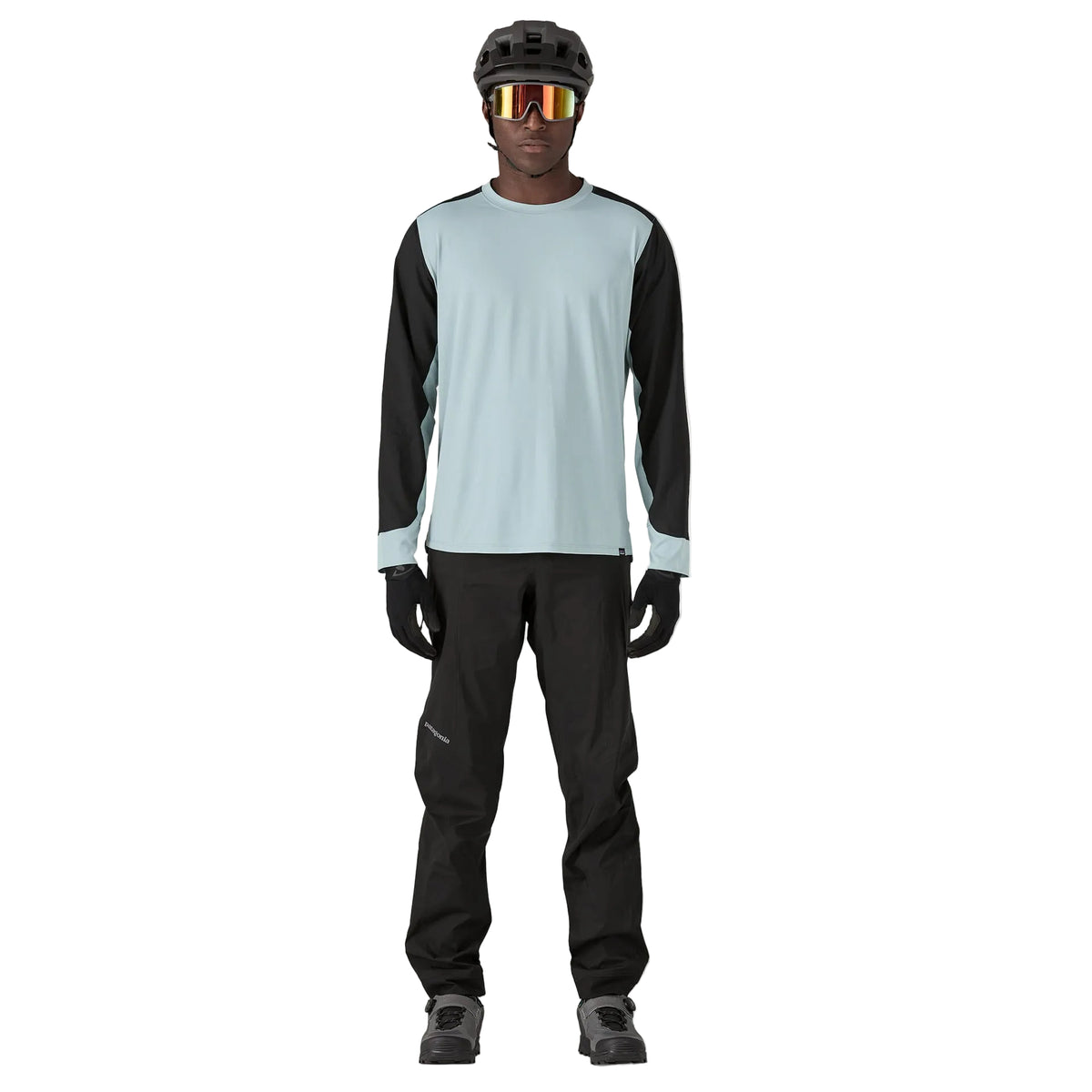 Patagonia Men's Dirt Roamer Storm waterproof mountain bike pants with reinforced knees, adjustable OppoSet® waistband, zippered thigh pockets and leg openings.