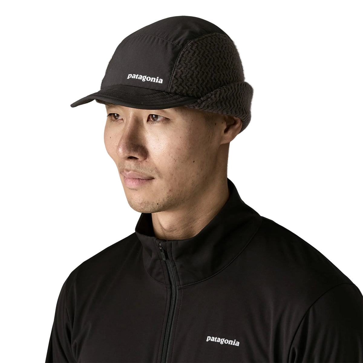 Patagonia Winter Duckbill Cap with recycled polyester ripstop crown, flip-down fleece earflaps, adjustable rear closure and crushable brim.