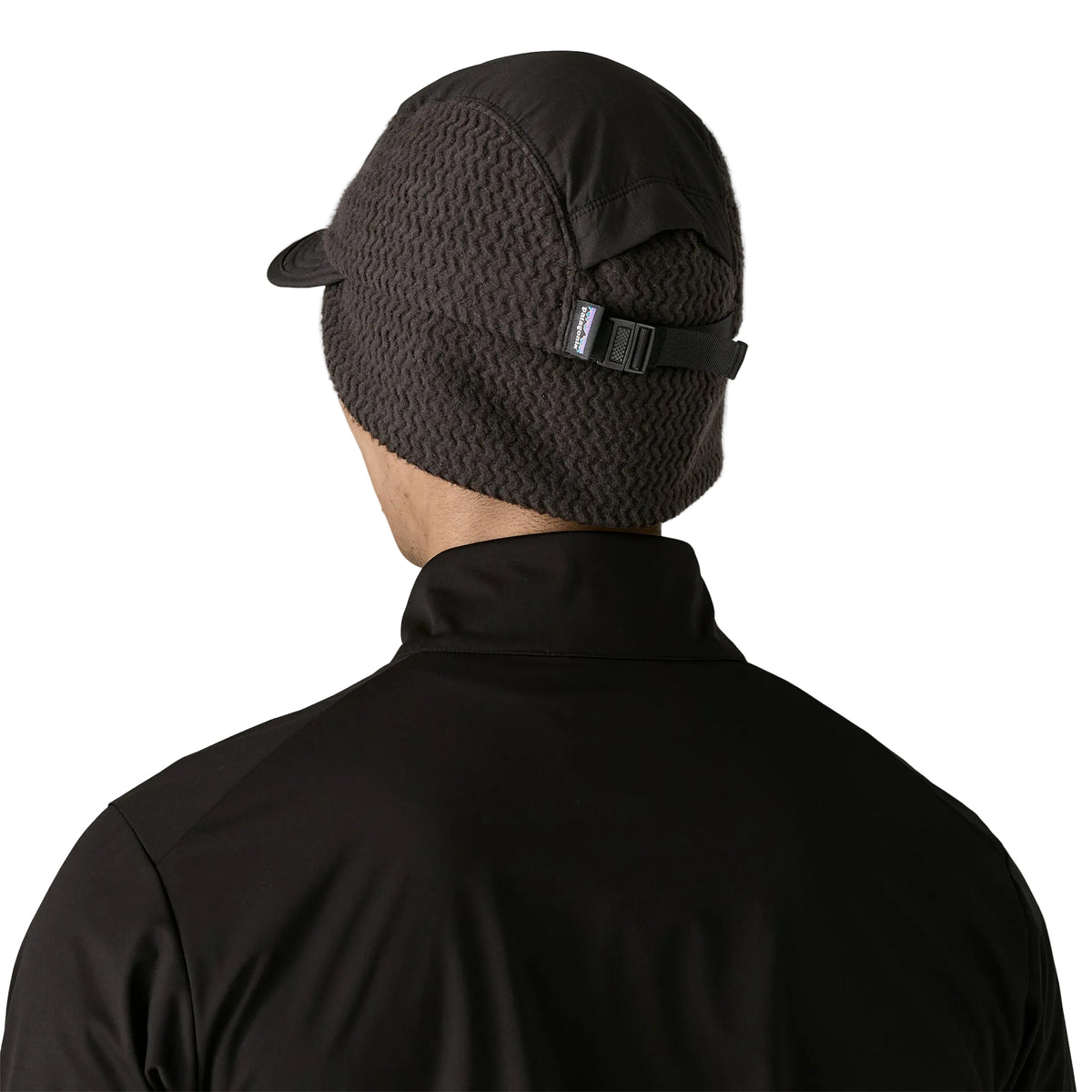 Patagonia Winter Duckbill Cap with recycled polyester ripstop crown, flip-down fleece earflaps, adjustable rear closure and crushable brim.