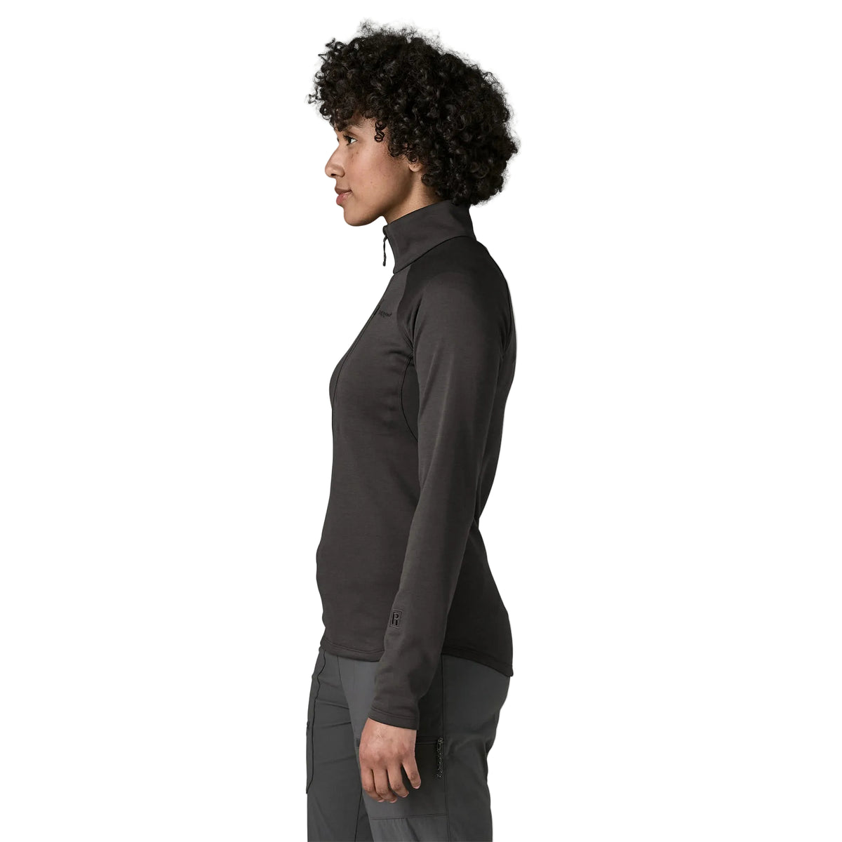 Patagonia Women's R1 Ultralight 1/2-Zip Pullover featuring lightweight recycled polyester double-knit fabric, deep front zipper and vertical zippered chest pocket.