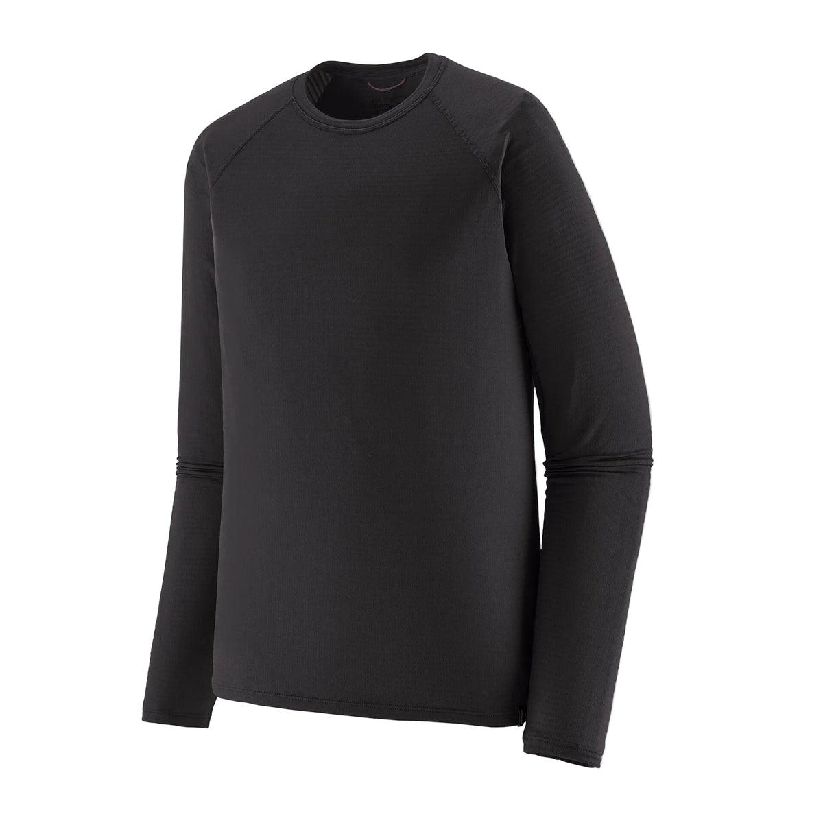 Patagonia Men's Capilene Thermal Weight Crewneck Black long-sleeve baselayer featuring Polartec® Power Grid® recycled polyester fabric, raglan sleeves and thumb loops.