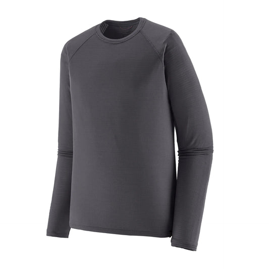 Patagonia Men's Capilene Thermal Weight Crewneck Smoulder Blue long-sleeve baselayer featuring Polartec® Power Grid® recycled polyester fabric, raglan sleeves and thumb loops.