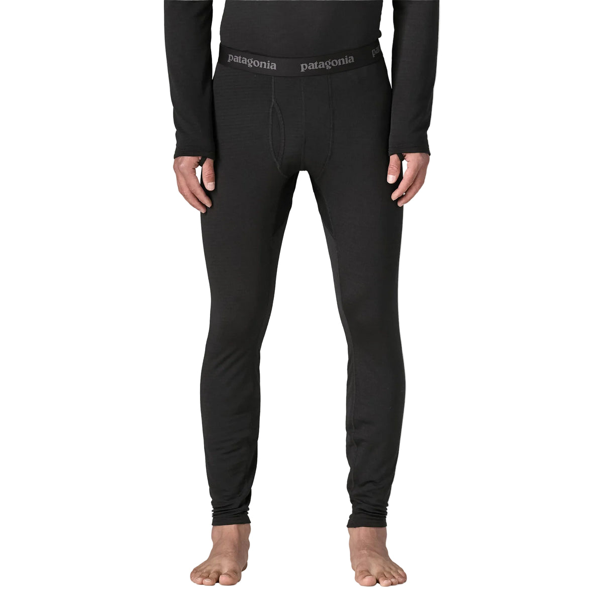 Patagonia Men's Capilene Thermal Weight Bottoms featuring Polartec® Power Grid® recycled polyester fabric, fitted construction and full-length legs.