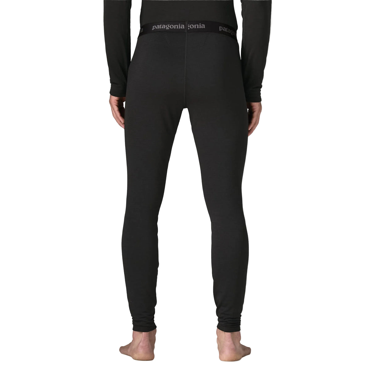 Patagonia Men's Capilene Thermal Weight Bottoms featuring Polartec® Power Grid® recycled polyester fabric, fitted construction and full-length legs.