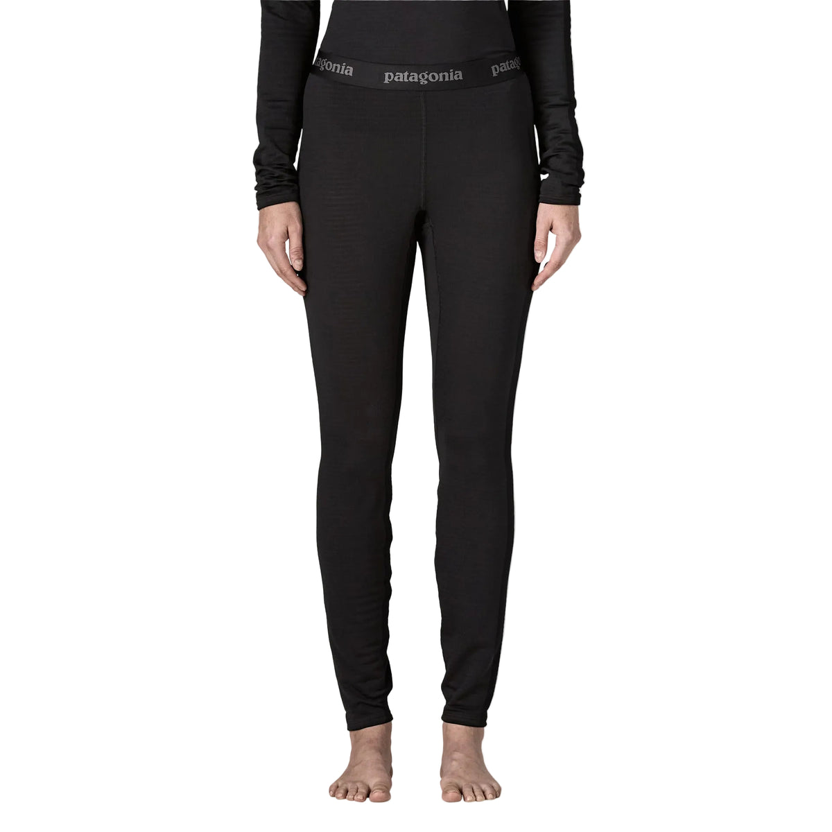 Patagonia Women's Capilene Thermal Weight Bottoms featuring Polartec® Power Grid® recycled polyester fabric and fitted, full-length construction.
