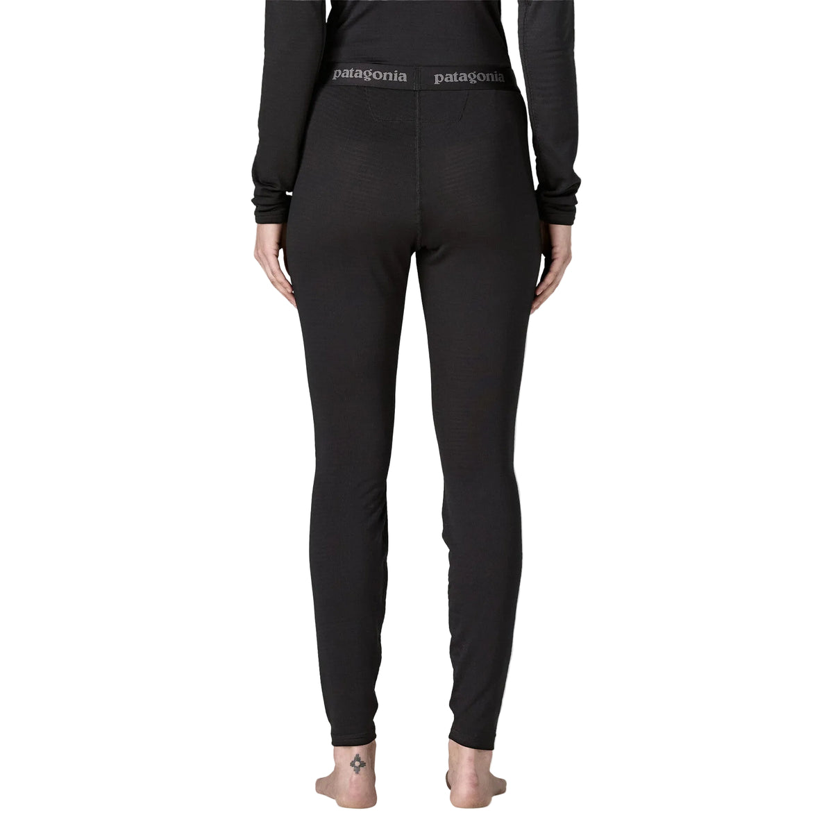 Patagonia Women's Capilene Thermal Weight Bottoms featuring Polartec® Power Grid® recycled polyester fabric and fitted, full-length construction.