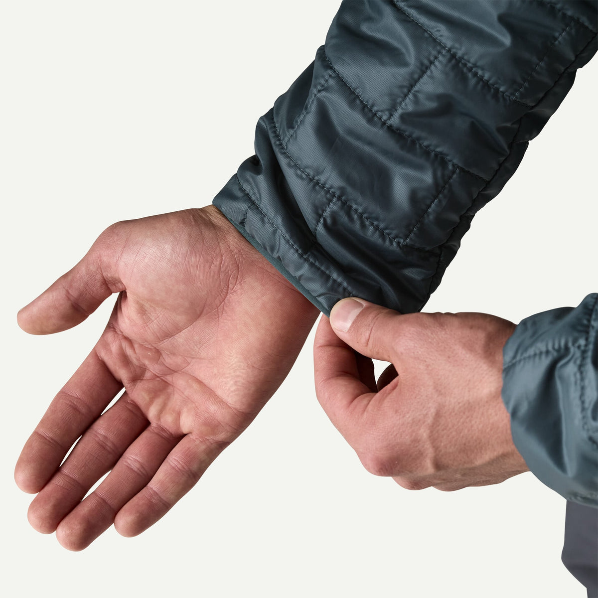 Patagonia Men's Nano Puff Jacket featuring recycled polyester ripstop fabric, signature brick quilting, full-length zipper and insulated construction.