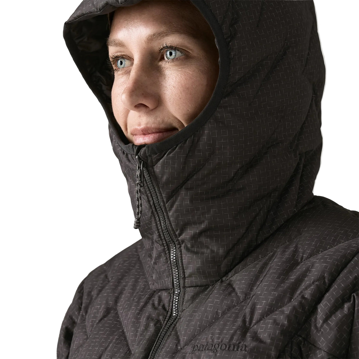 Patagonia Women's Durable Down Hoody featuring abrasion-resistant ripstop fabric, insulated adjustable hood, full-length zipper and quilted down construction.