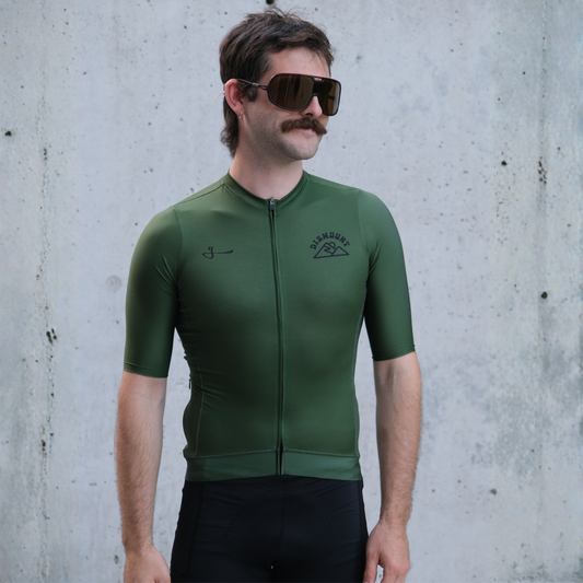 Dismount Gween! Cycling Jersey by Givelo with Italian body fabric, raw-edge sleeves, reflective pocket edging and silicone grip waistband.