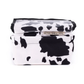Outer Shell Drawcord Bicycle Handlebar Bag in Cow pattern fabric. Designed for storing essentials on bike and one handed access.