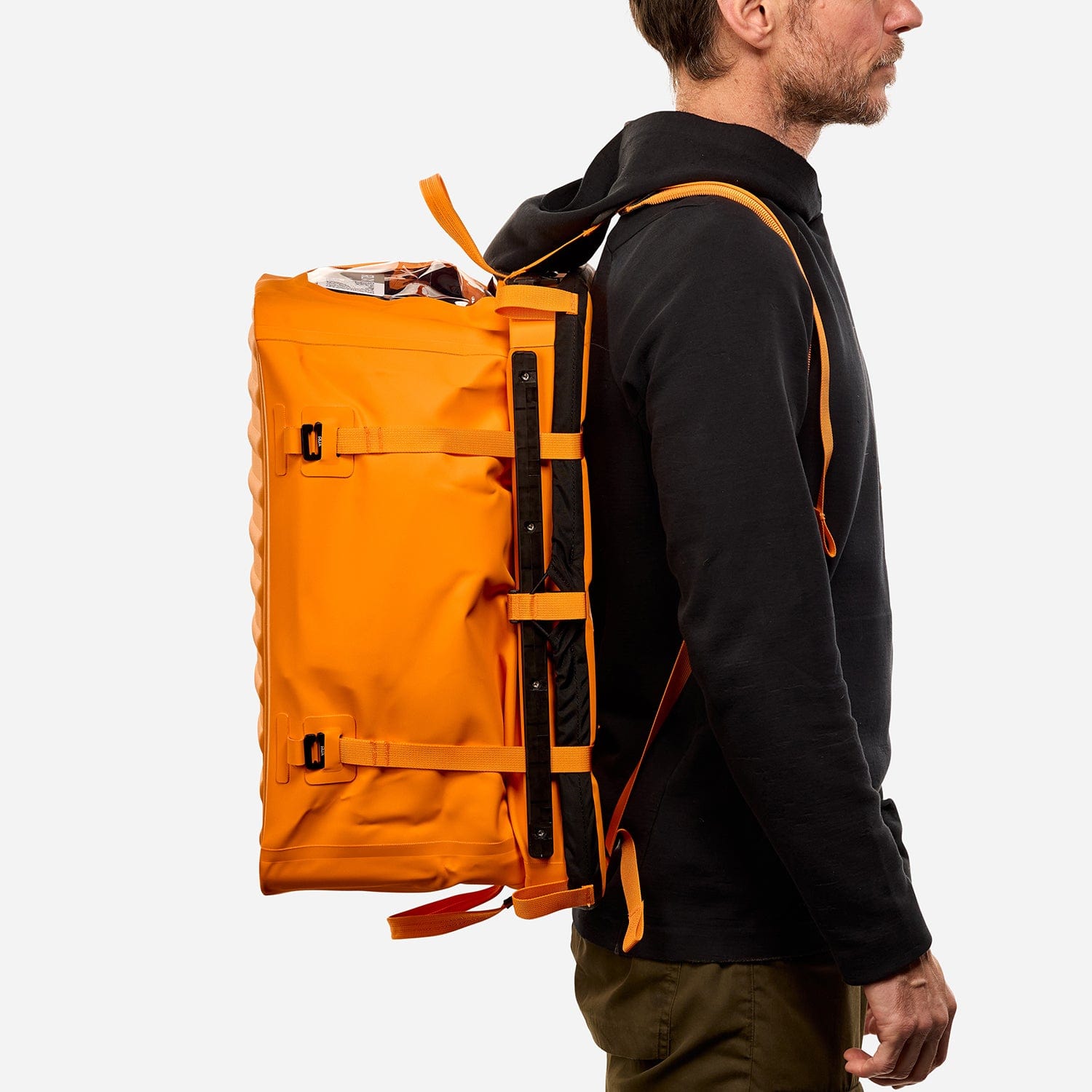 Rux 70L Gear Box for organizing outdoor equipment for camping, biking, hiking, rock climbing and road tripping. Modular gear box in Orange with waterproof press-seal lid.