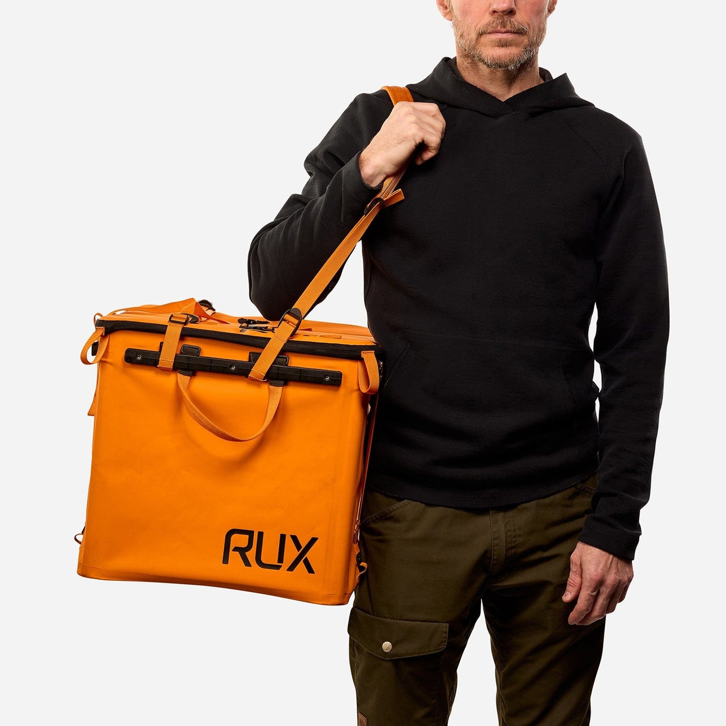 Rux 70L Gear Box for organizing outdoor equipment for camping, biking, hiking, rock climbing and road tripping. Modular gear box in Orange with waterproof press-seal lid.