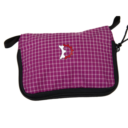 Revelate Designs Skedaddle Bag compact organizer pouch for keeping bike repair tools, small essentials, cables and other bike trip gear organized.