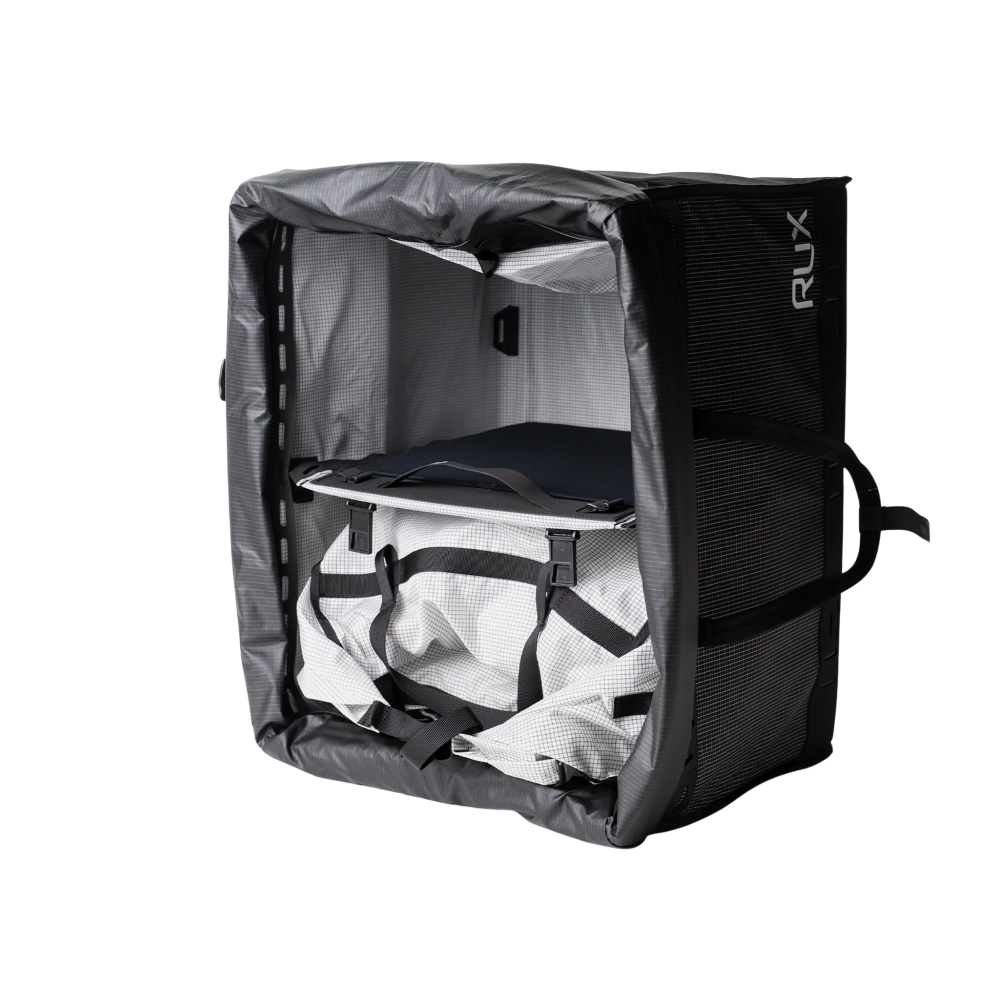 Rux Duffel Box 55L Plus in Green with Universal Shoulder Strap included. Storage and organization of outdoor gear for travel, camping, biking, climbing, and more.