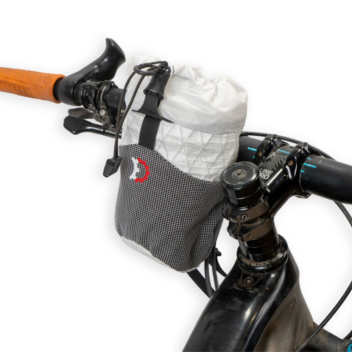 Revelate Designs Speedbag lightweight bikepacking feed bag, with a slim contoured shape, bottle storage and stretch pocket for fast rides and ultra racing
