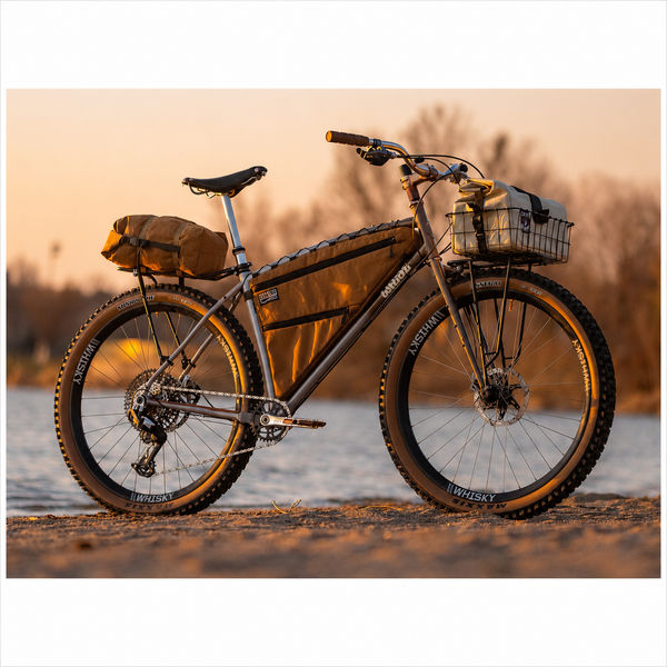 Wilde Supertramp frameset in Dirt Champagne designed for custom builds for bikepacking, ATBs, trekking with mounts for all accessories - example of fully loaded and built Supertramp