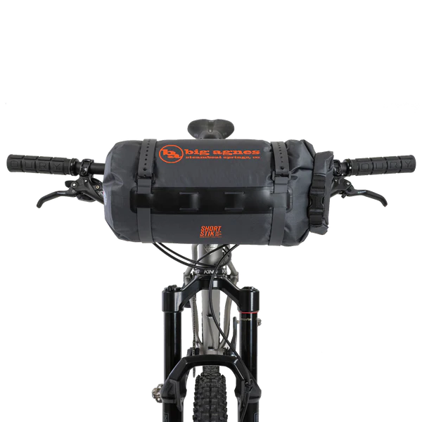 Big Agnes Copper Spur UL2 Bikepack two person ultralight tent mounted on a bike handlebar