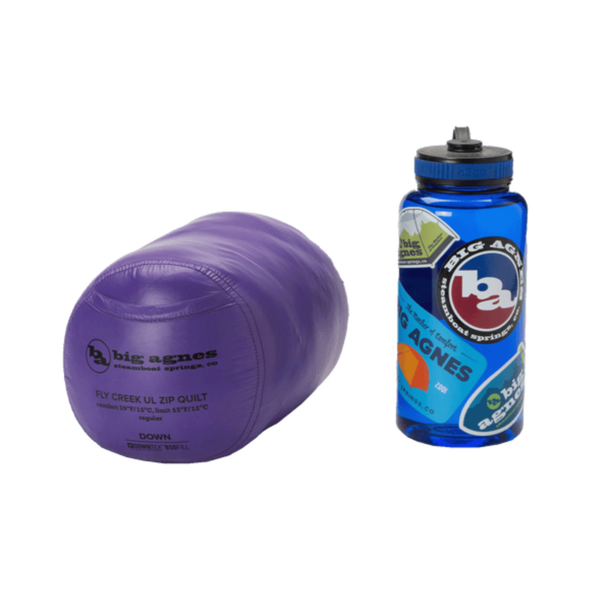 Packed Fly Creek UL Zip Quilt in stuff sack next to Nalgene bottle