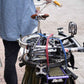 Blue Lug Flat Bungee elastic bicycle cargo strap with steel-structured hooks for securing bags and belongings to bicycle racks and baskets.