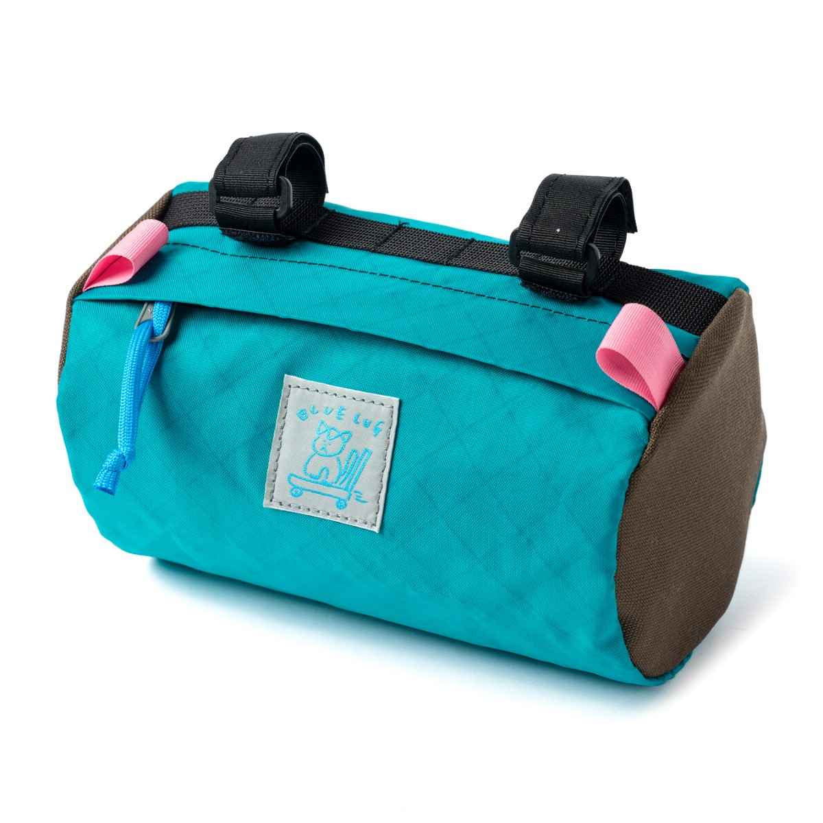 Blue Lug Handlebar Pouch featuring a compact, soft-sided nylon construction with removable straps for mounting to bicycle handlebars.