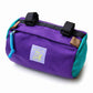 Blue Lug Handlebar Pouch featuring a compact, soft-sided nylon construction with removable straps for mounting to bicycle handlebars.