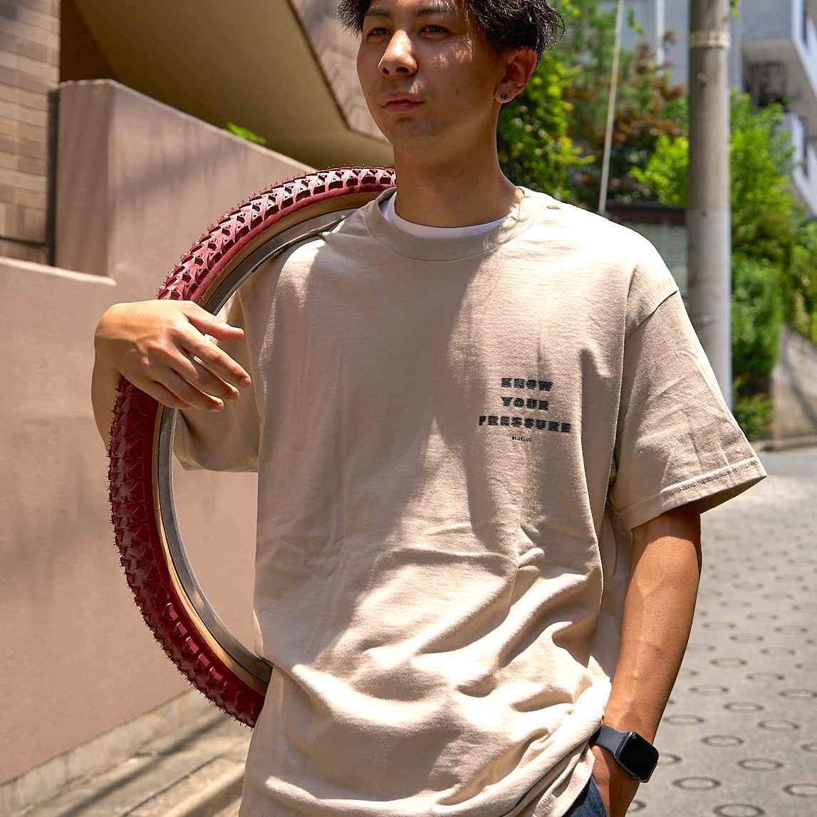 Blue Lug Tire Air T-Shirt in sand with front graphic. Available Canada wide.