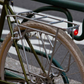 Blue Lug Koma Light Rear compact USB rechargeable bicycle taillight in silver mounted to a rear rack