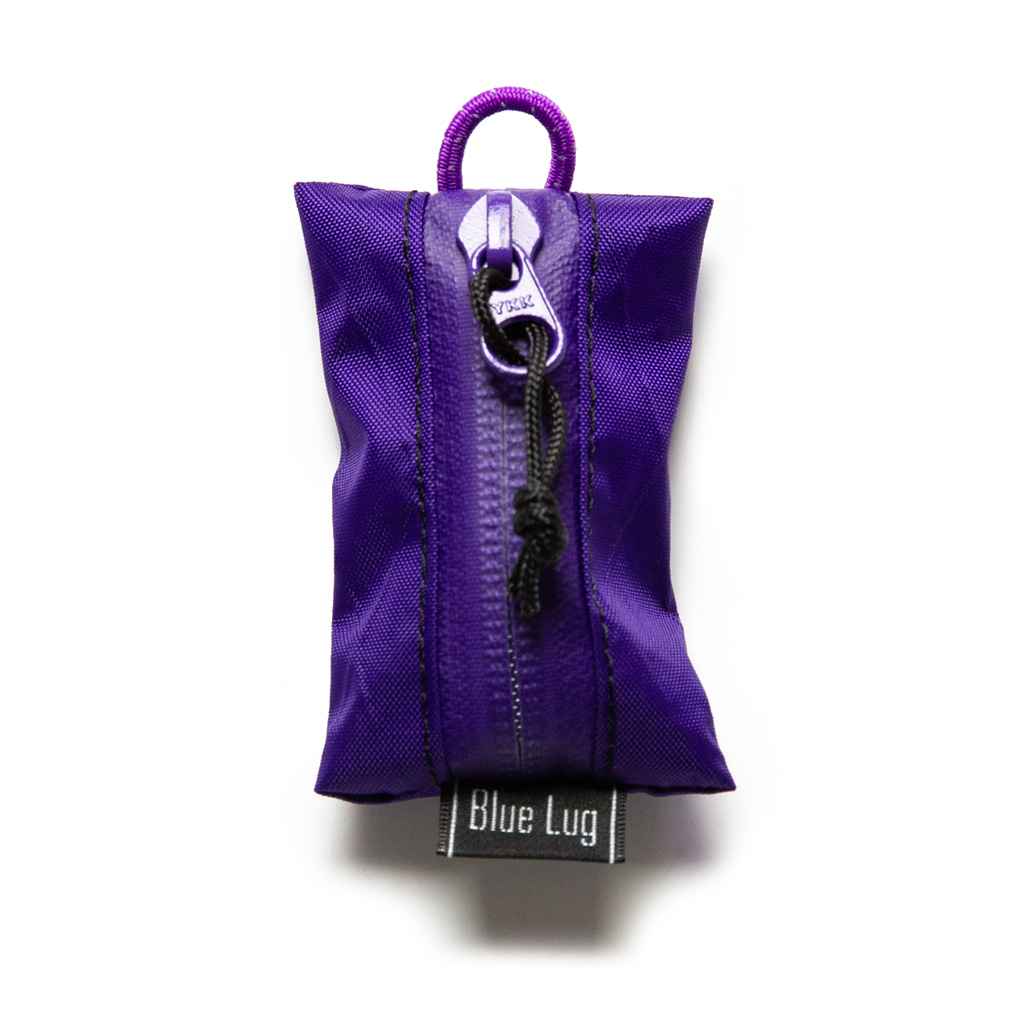 Blue Lug Kozeni Pouch, a compact Japanese-made coin and accessory pouch available in assorted technical fabrics and printed designs.