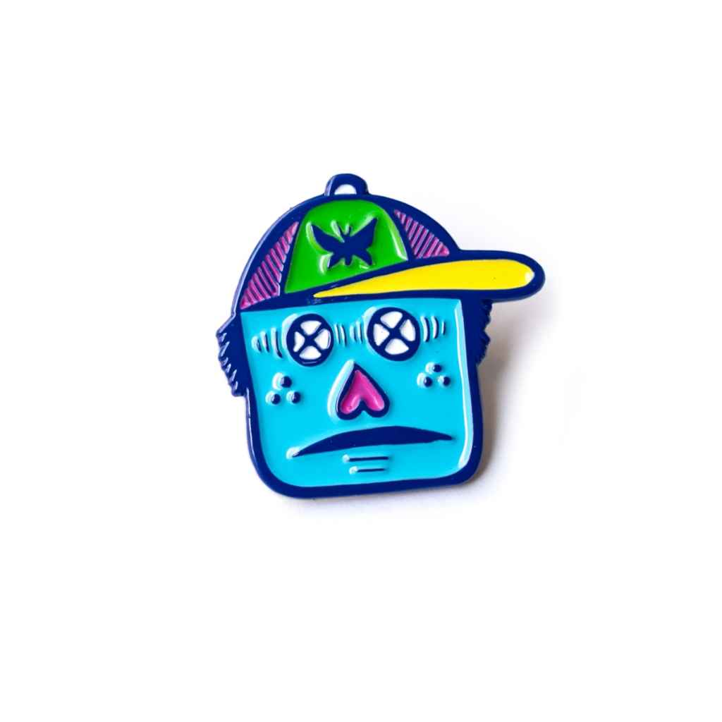 Assorted Blue Lug decorative pins featuring playful original artwork and designs for jackets, hats and bags.