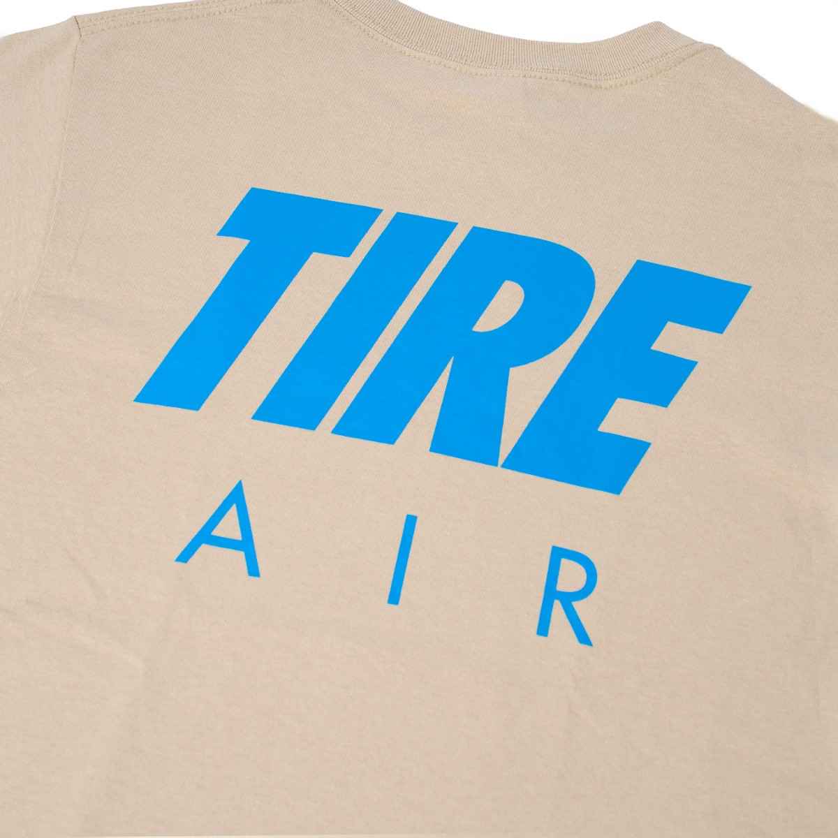Blue Lug Tire Sir graphic tee detail in Sand. Available in Toronto, Canada.