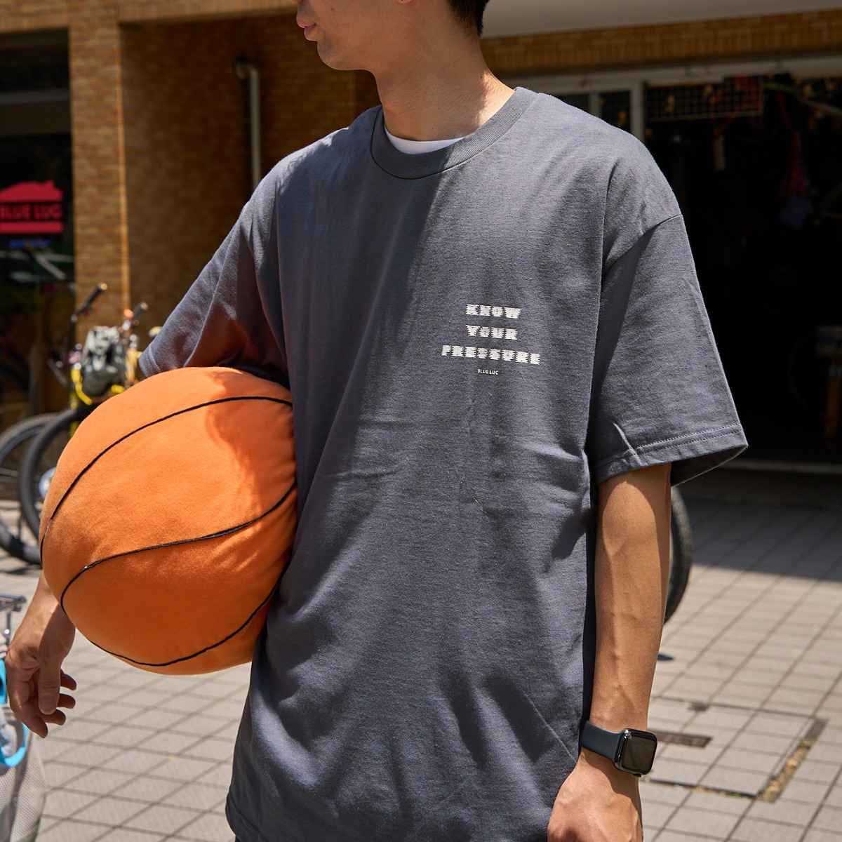 Detail of front side of Blue Lug Tire Air T-Shirt in Charcoal with Tire Air graphic text.  Available in Toronto, Canada.