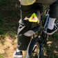 Blue Lug Triangle Reflector in Yellow mounted beneath a bicycle saddle above a fender