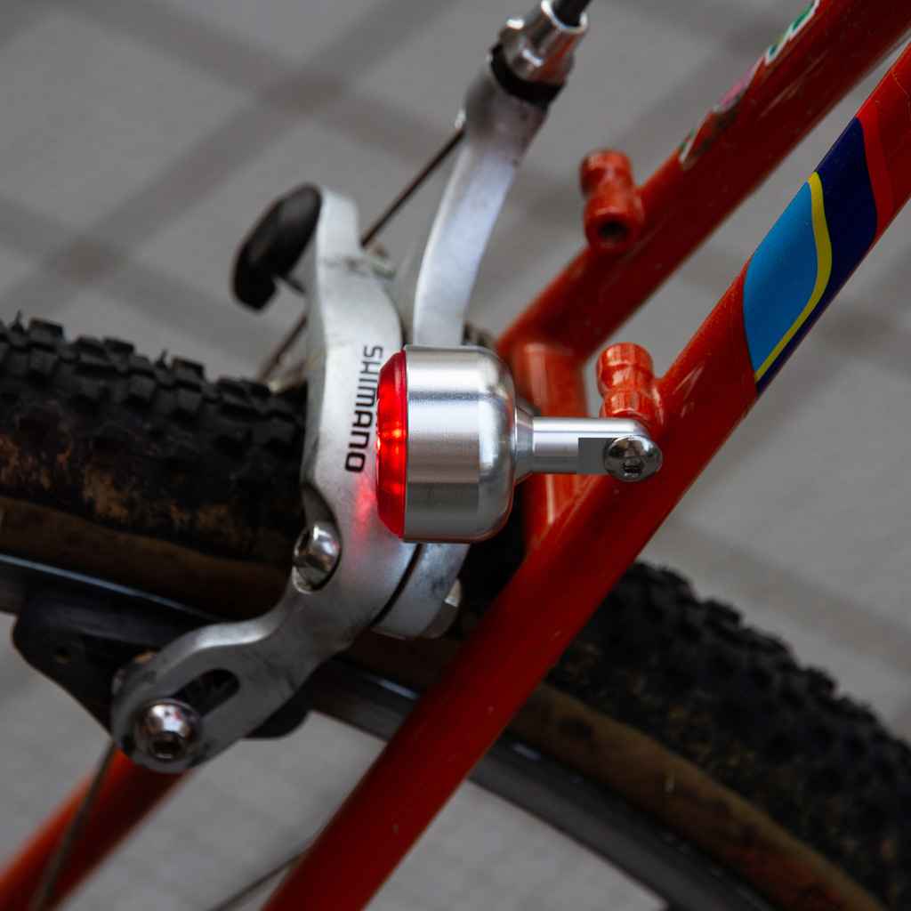 Blue Lug KOMA Light Mount in silver, original aluminum bicycle light bracket compatible with front and rear KOMA Light mounting