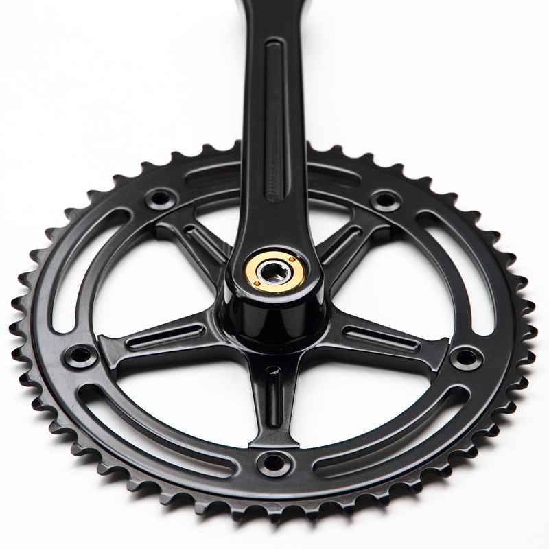 Blue Lug RMC Track Crank Set in all black with slim crank arms and hollow 46T chainring for single-speed track bikes.