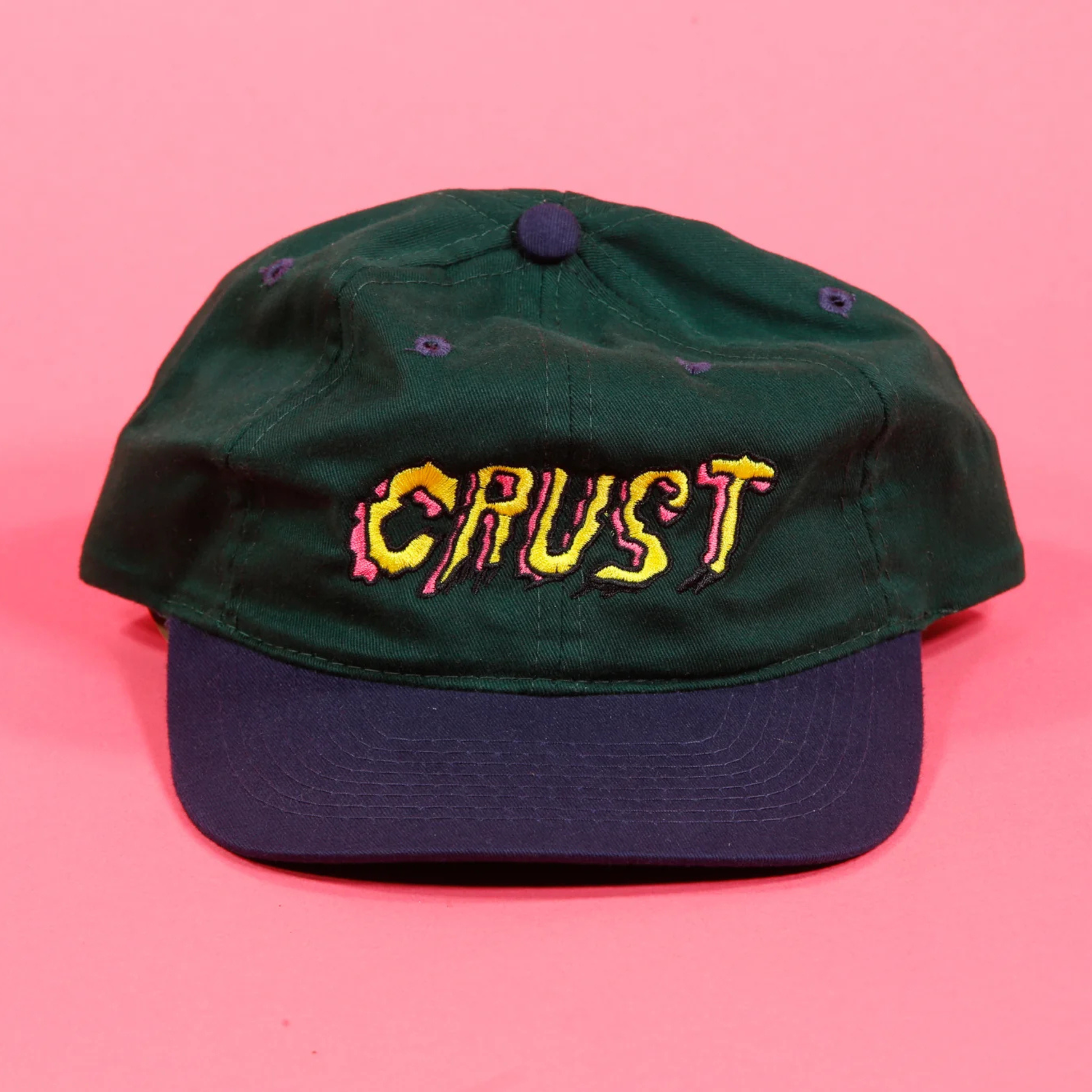 Crust Bikes embroidered hat green and navy colour front view