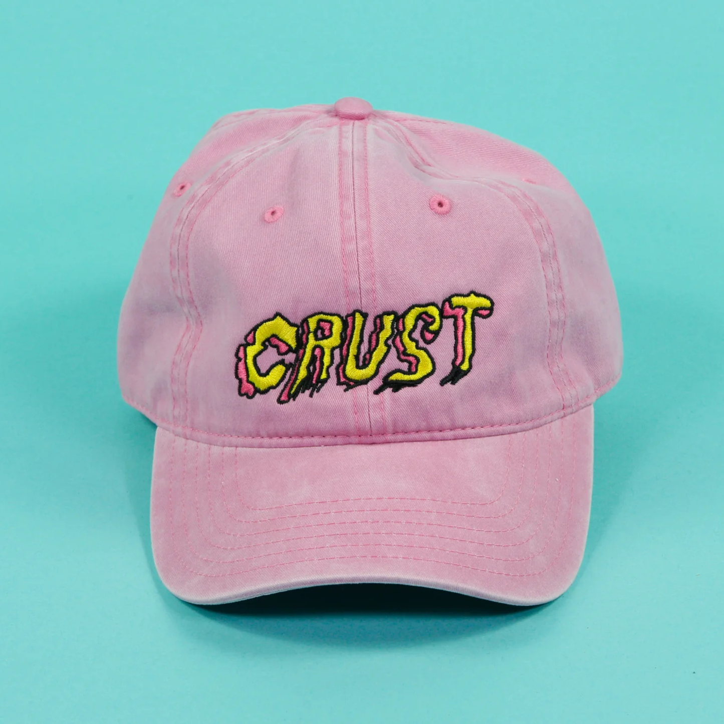 Crust Bikes embroidered hat pink colour front view