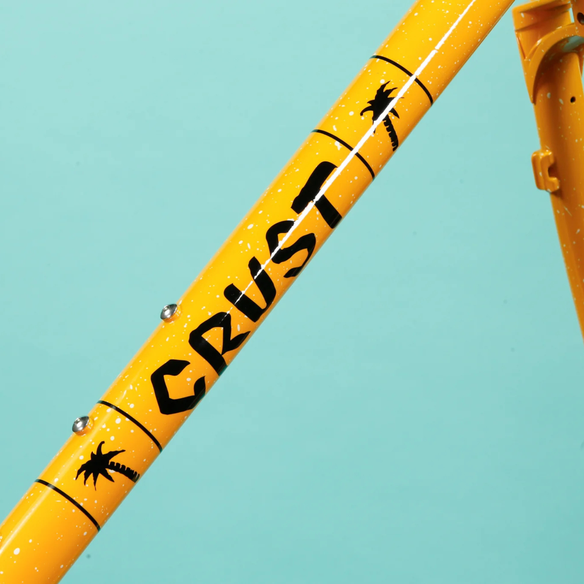 Crust Bikes Evasion frameset downtube with the. CRUST logo, close up detail 