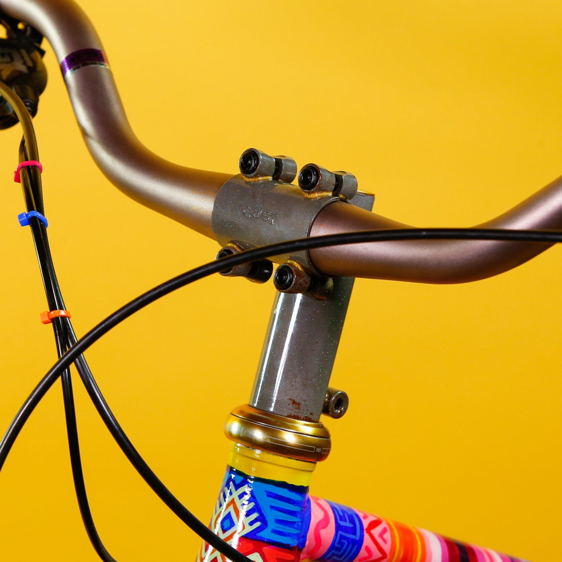 Crust SST “Tall Shorty”  in rainbow flake clear installed on bike with riser bar.