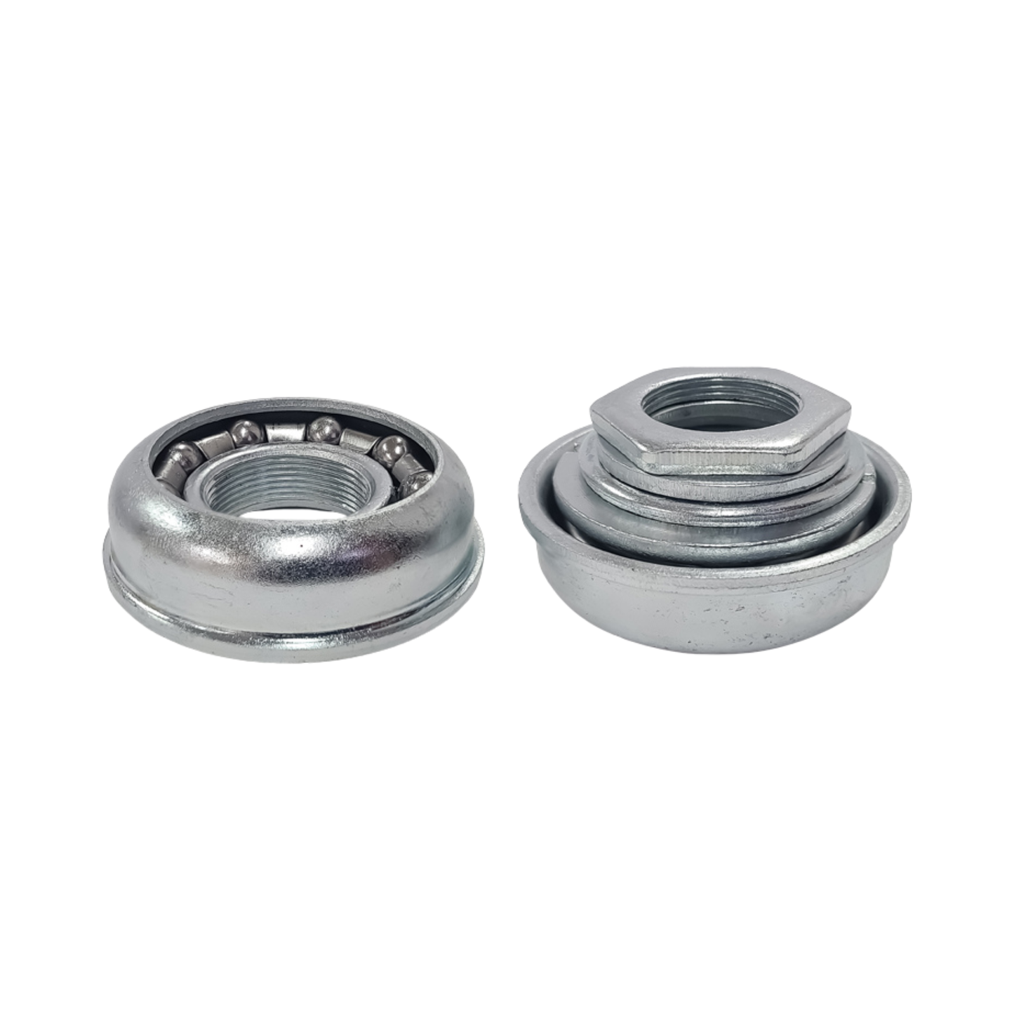 Close-up of non-sealed bottom bracket cups and bearings